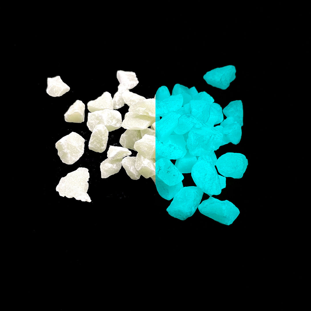 Day and night comparison of a few Aqua Blue Ultra Grade Glow Stones