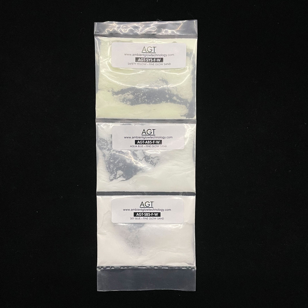 Fine Glow Sand Sample Strip in Sky Blue, Aqua Blue, and Emerald Yellow. Day time view.