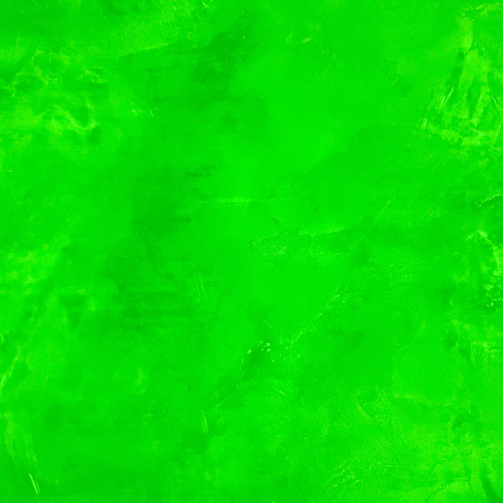 A bag of our high performance, AGT™ Safety Yellow Fine Glow Sand featuring best-in-class glow performance and an encapsulated particle matrix. Close up view of glow in the dark sand.