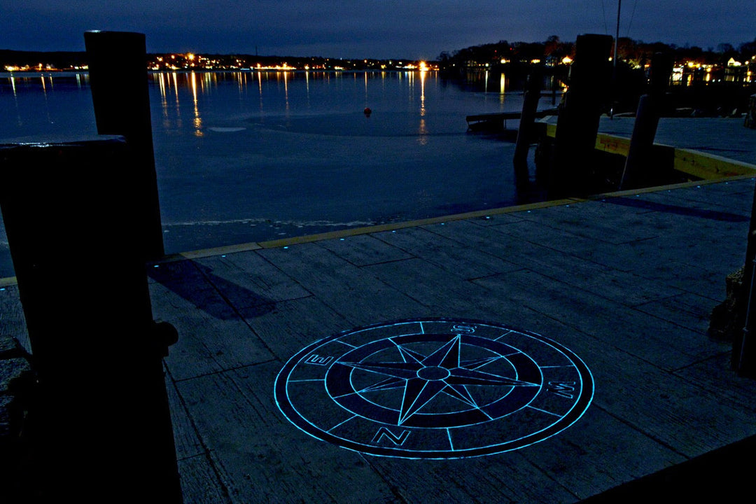 Glowing Compass Medallion on a Stamped Concrete Dock