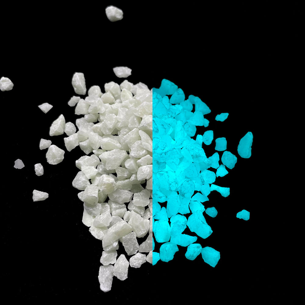 Day and night comparison of a pile of Aqua Blue Ultra Grade Glow Stones