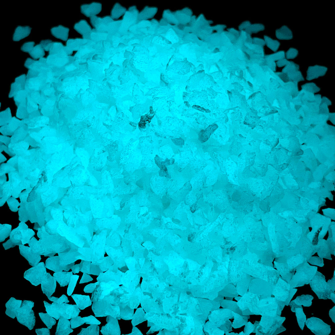 Close up view of a large pile of glowing Aqua Blue Ultra Grade Glow Stones