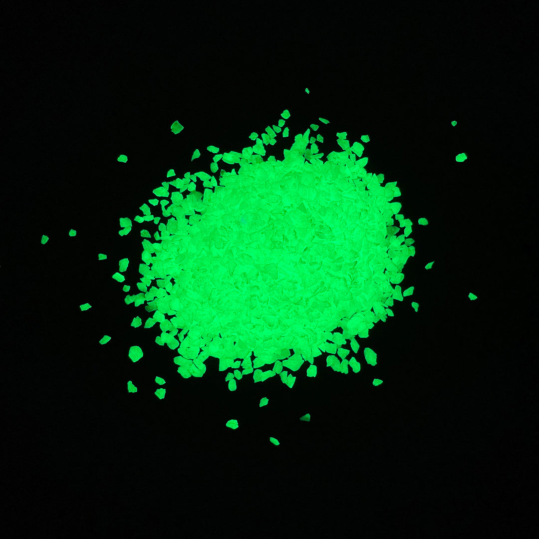 Night time glowing view of the 1/8" Emerald Yellow Ultra Grade Glow Stones
