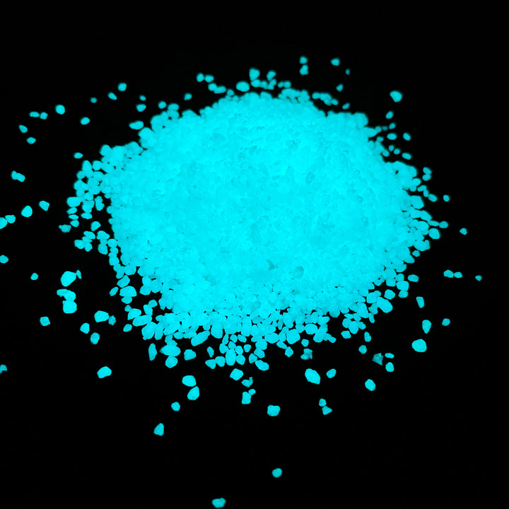 1lb. pile of glowing Aqua Blue Resin Glow Sand