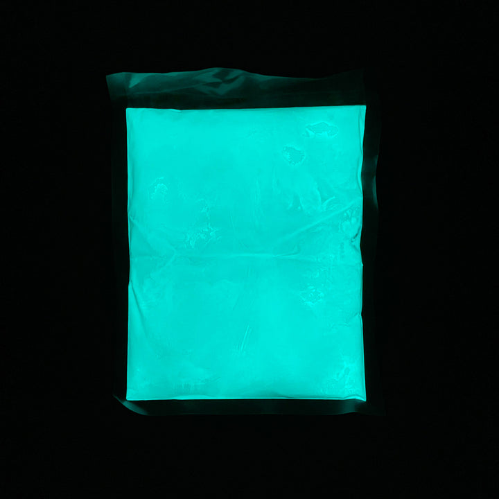 Glowing 1lb. bag of Aqua Blue Fine Glow Sand
