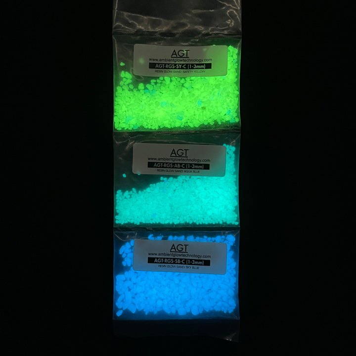 AGT™ Resin Glow Sand Sample Strip in Aqua Blue, Sky Blue, and Safety Yellow. Glow in the dark view.