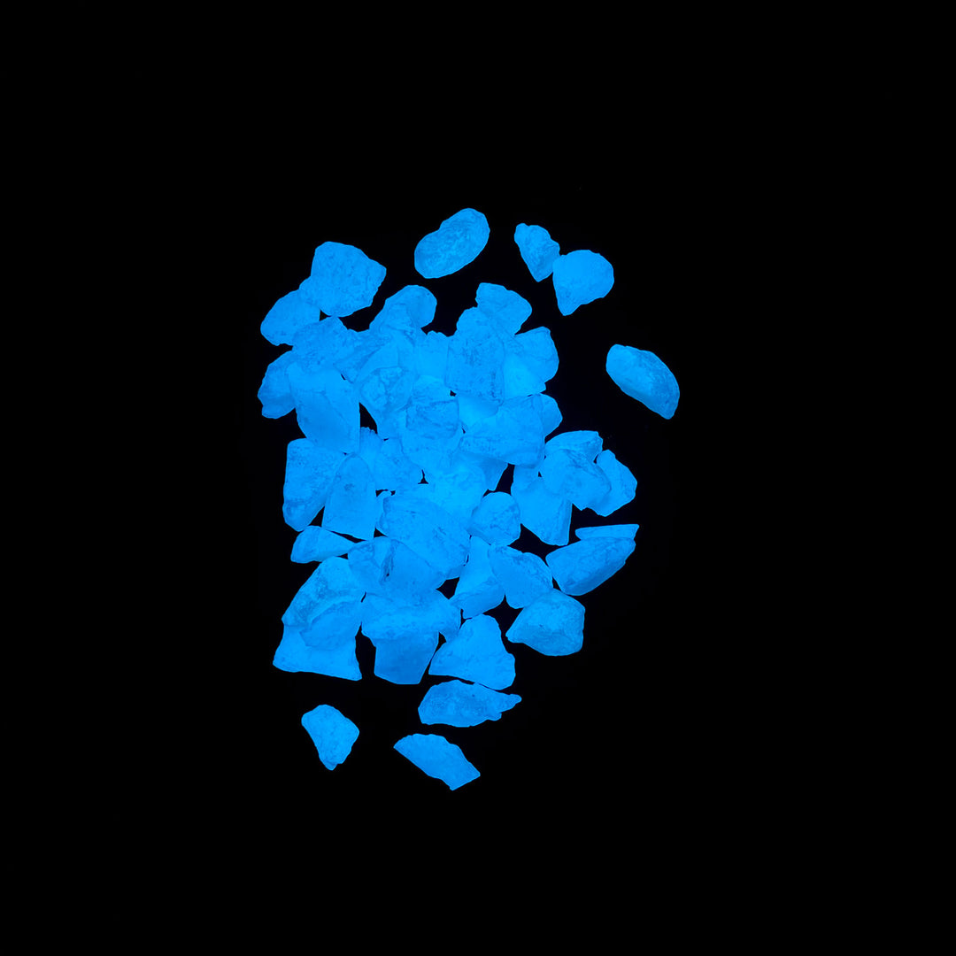 AGT™ Sky Blue ULTRA Grade Glow Stones 1/2". Glow in the dark view.